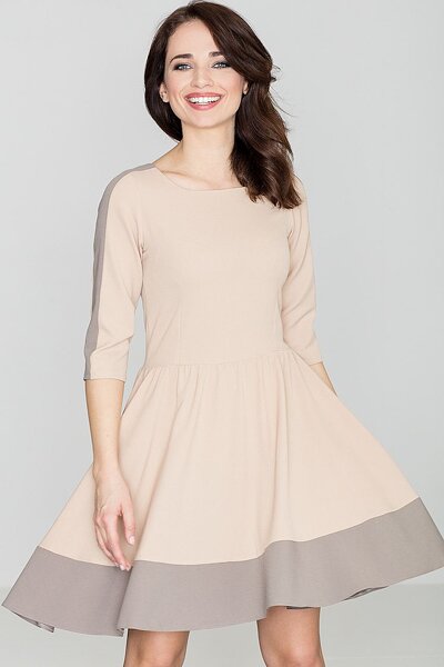 Rozkloszowana sukienka w beżowym kolorze