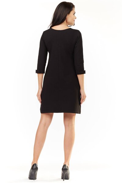 Czarna trapezowa sukienka mini z ozdobną kokardką