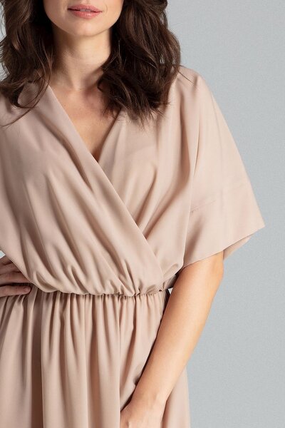 Długa beżowa sukienka z rozcięciami