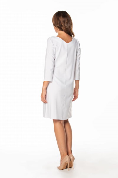 Sukienka midi w białym kolorze wiązana z boku