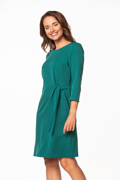 Sukienka midi w zielonym kolorze wiązana z boku