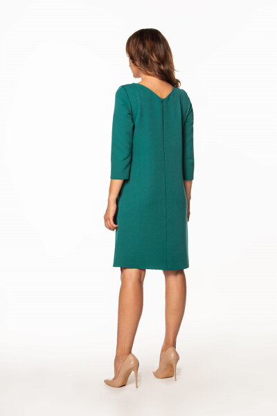 Sukienka midi w zielonym kolorze wiązana z boku