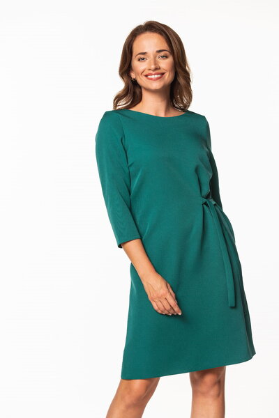 Sukienka midi w zielonym kolorze wiązana z boku