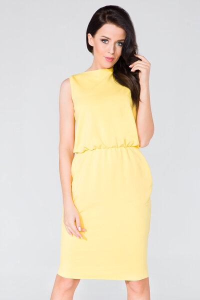 Sukienka w kolorze żółtym ściągnięta w talii
