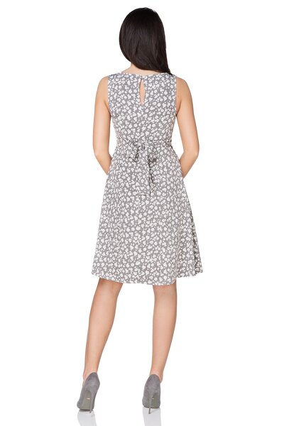 Sukienka rozkloszowana z kokardą w beżowym odcieniu